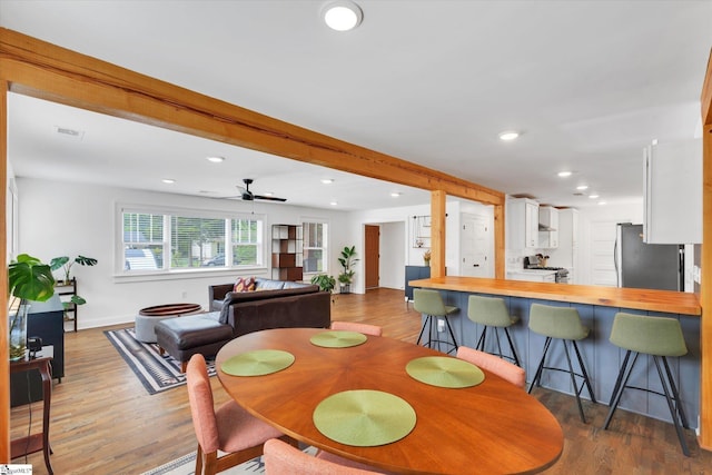 dining area featuring recessed lighting, wood finished floors, visible vents, and ceiling fan