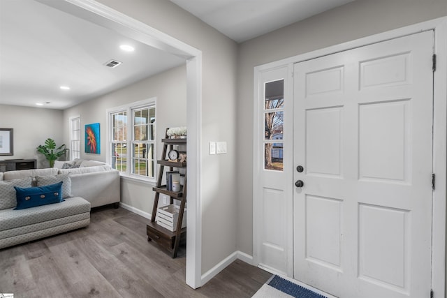 entrance foyer with visible vents, recessed lighting, baseboards, and wood finished floors