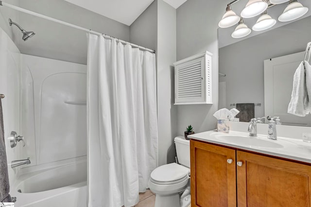 bathroom featuring vanity, tile patterned floors, toilet, and shower / bath combo