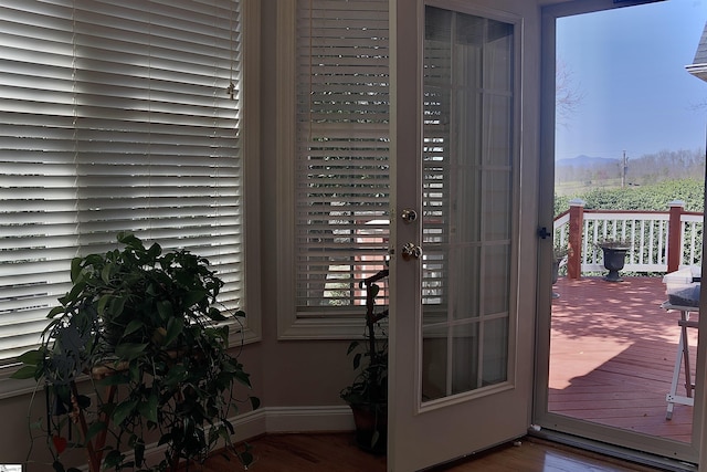 details with wood finished floors and baseboards