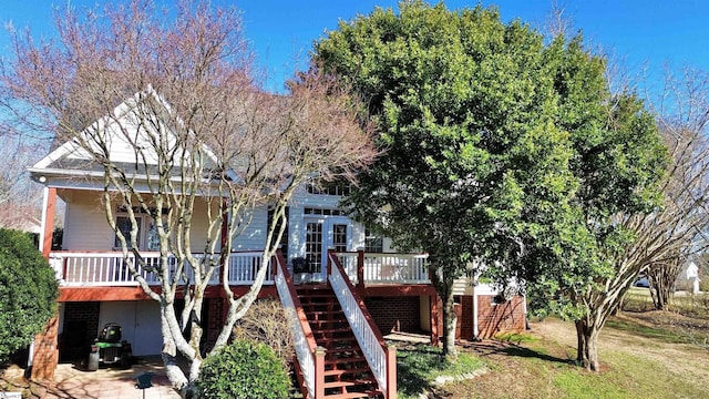 rear view of house with stairway