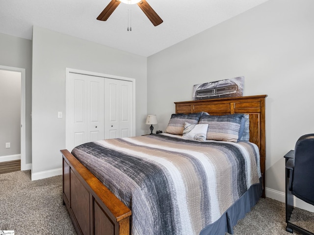 carpeted bedroom with a closet, baseboards, and a ceiling fan