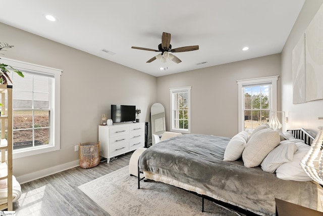 bedroom with visible vents, wood finished floors, recessed lighting, baseboards, and ceiling fan