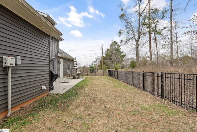 view of yard featuring a patio and a fenced backyard