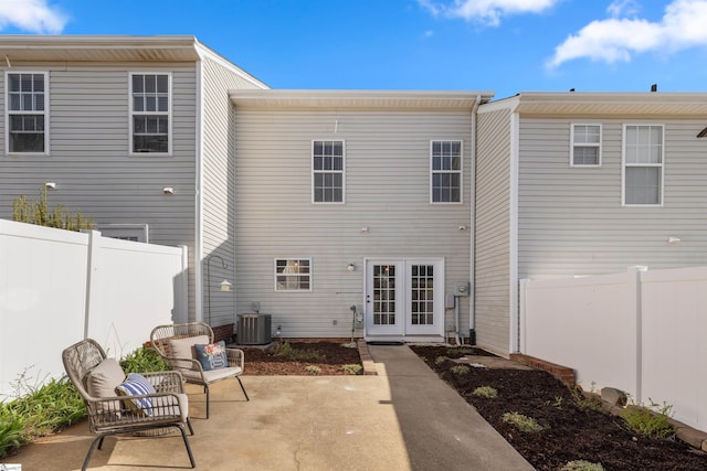 back of house with a patio area, cooling unit, french doors, and fence