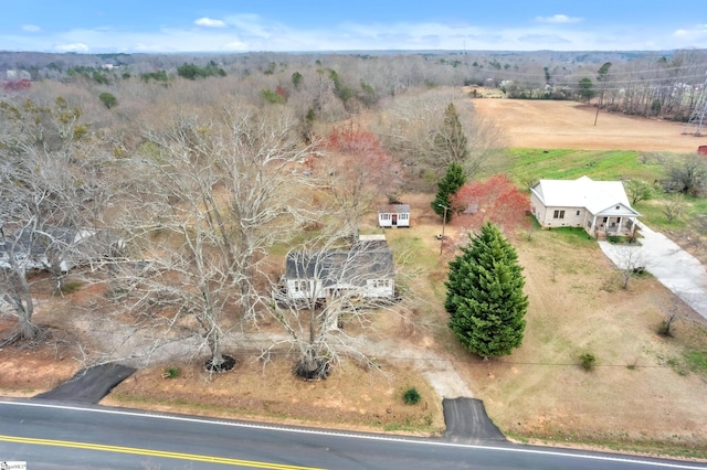 birds eye view of property featuring a rural view