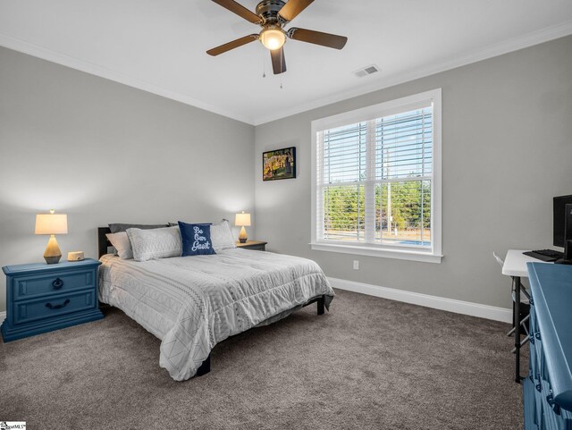 bedroom with visible vents, baseboards, carpet, and crown molding