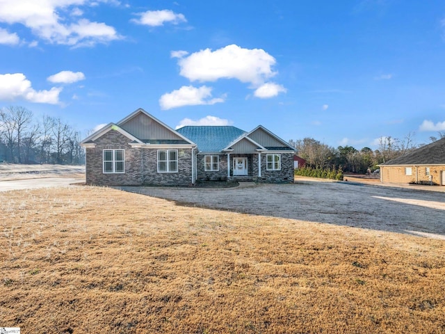 view of front of property featuring stone siding