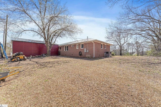 view of yard with central AC