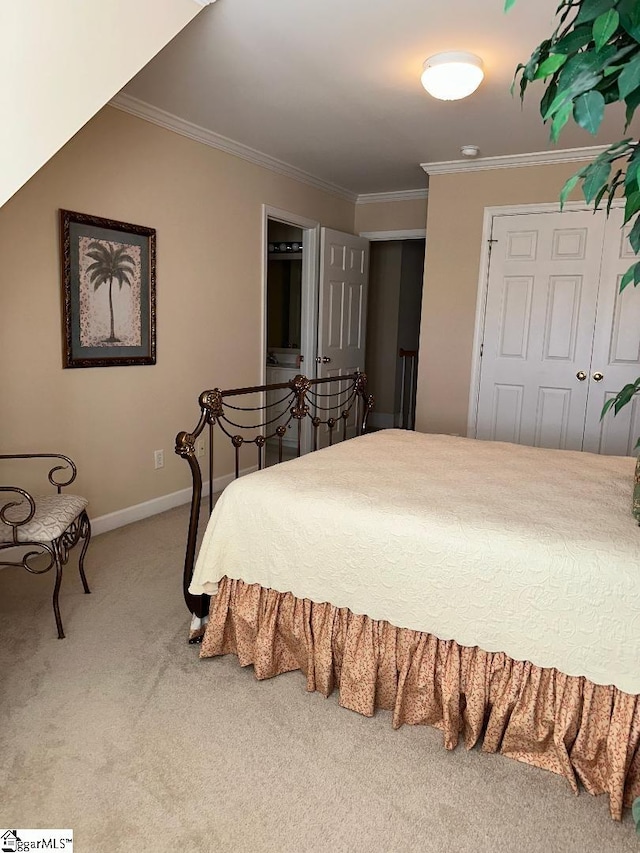 bedroom with baseboards, carpet floors, and ornamental molding