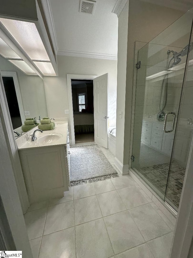 full bath featuring visible vents, a shower stall, crown molding, a bath, and a sink