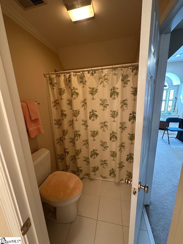 full bath with a shower with shower curtain, visible vents, toilet, and tile patterned flooring