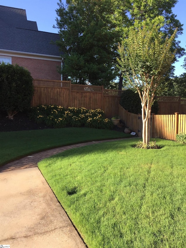 view of yard with fence