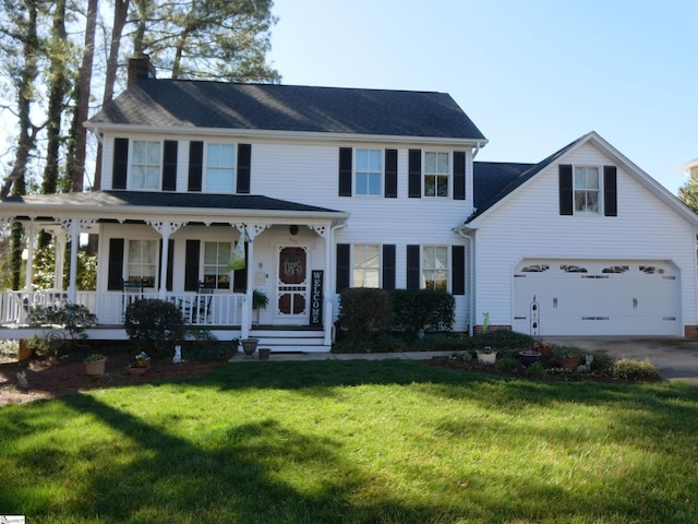 view of front of home featuring driveway, a porch, a chimney, a front lawn, and a garage