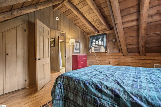 bedroom featuring cooling unit, light wood-style flooring, vaulted ceiling with beams, wood walls, and wooden ceiling