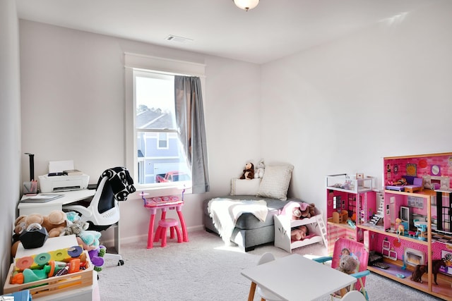 playroom with baseboards and carpet floors