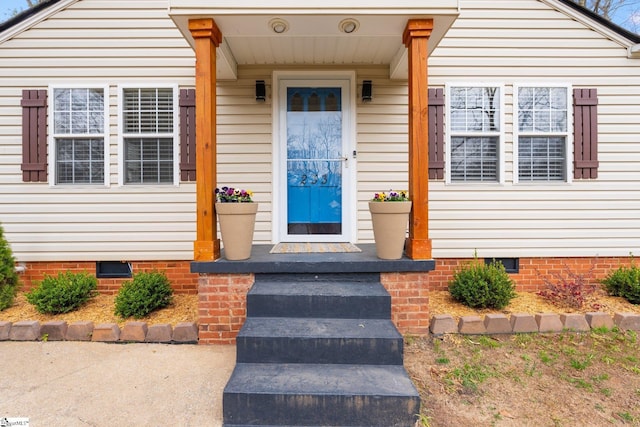 view of exterior entry with crawl space