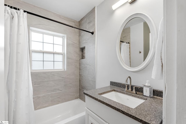 bathroom with vanity and shower / tub combo with curtain