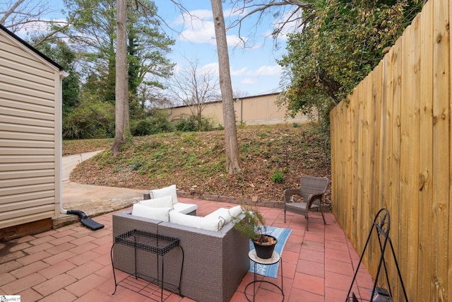 view of patio / terrace featuring fence