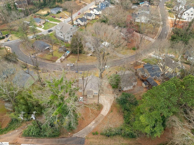 birds eye view of property with a residential view