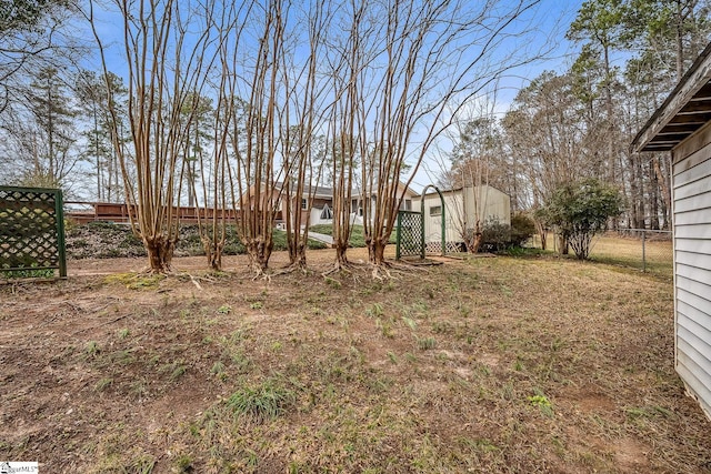 view of yard featuring fence