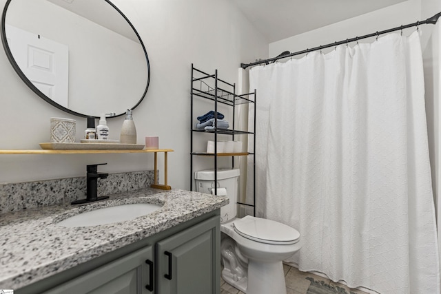 full bath featuring vanity, tile patterned floors, toilet, and a shower with shower curtain