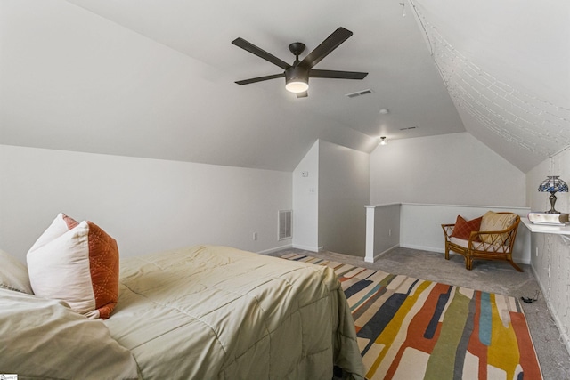 bedroom with lofted ceiling, carpet flooring, visible vents, and ceiling fan