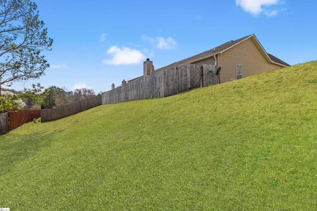 view of yard featuring fence