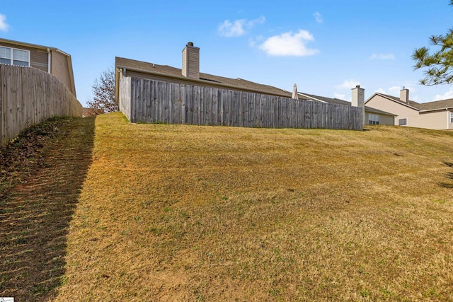 view of yard with fence