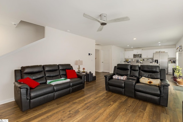 living room with dark wood-type flooring, recessed lighting, baseboards, and ceiling fan