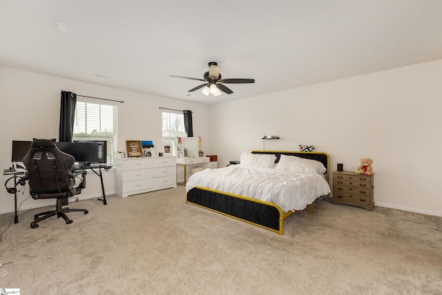 bedroom with baseboards, carpet, and a ceiling fan