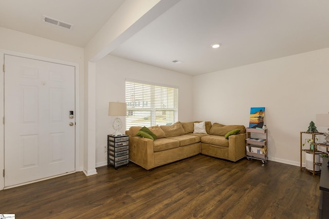 living room featuring dark wood-type flooring, recessed lighting, baseboards, and visible vents