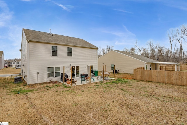 back of property featuring cooling unit, a patio, and fence