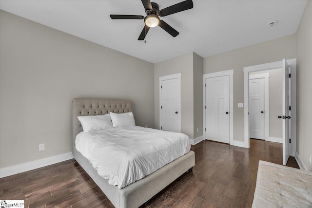 bedroom featuring ceiling fan, baseboards, and wood finished floors