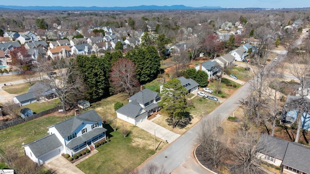 drone / aerial view with a mountain view and a residential view