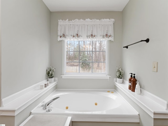 bathroom featuring a jetted tub