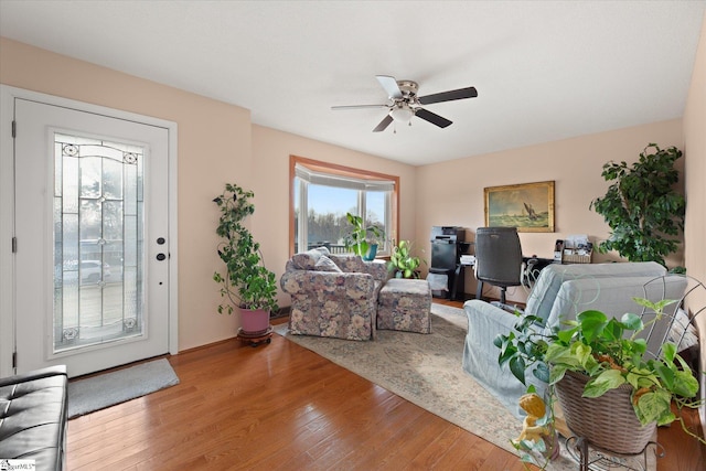 interior space featuring ceiling fan and hardwood / wood-style flooring