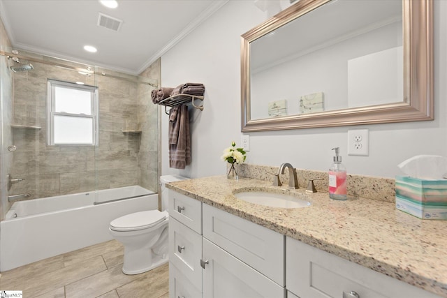 bathroom with visible vents, toilet, shower / bathtub combination, crown molding, and vanity