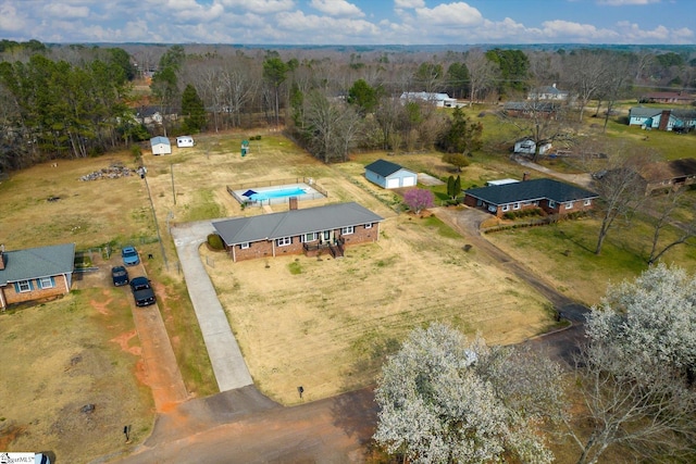 birds eye view of property featuring a rural view