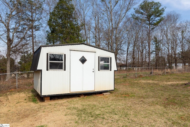 view of shed with a fenced backyard