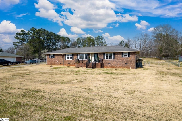 ranch-style house featuring crawl space, brick siding, and fence