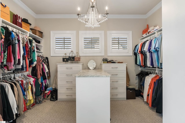 walk in closet featuring an inviting chandelier