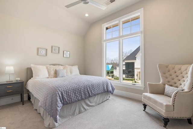 bedroom with visible vents, multiple windows, light colored carpet, and baseboards