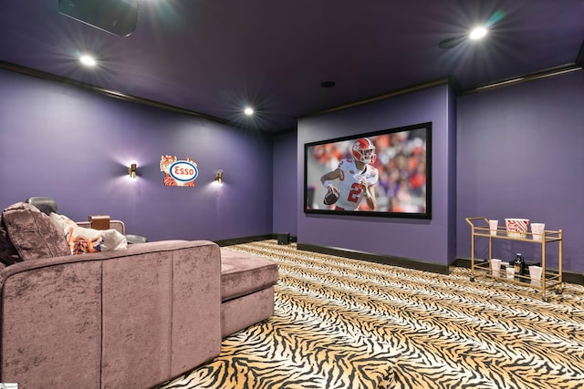 home theater room featuring recessed lighting, baseboards, and crown molding