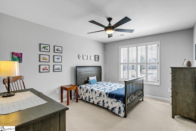 bedroom with ceiling fan, baseboards, visible vents, and light carpet