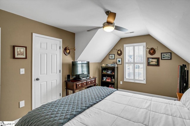 bedroom featuring visible vents, ceiling fan, and vaulted ceiling