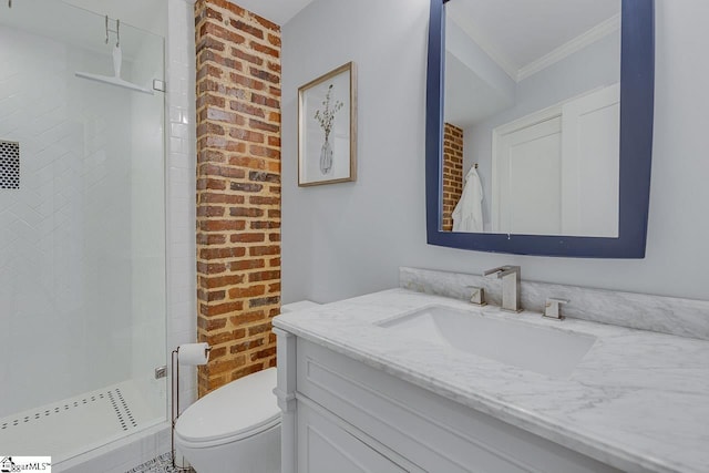 full bathroom with vanity, a shower stall, toilet, and ornamental molding