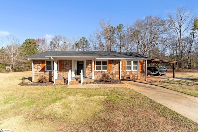 ranch-style home featuring brick siding, an attached carport, driveway, and a front lawn