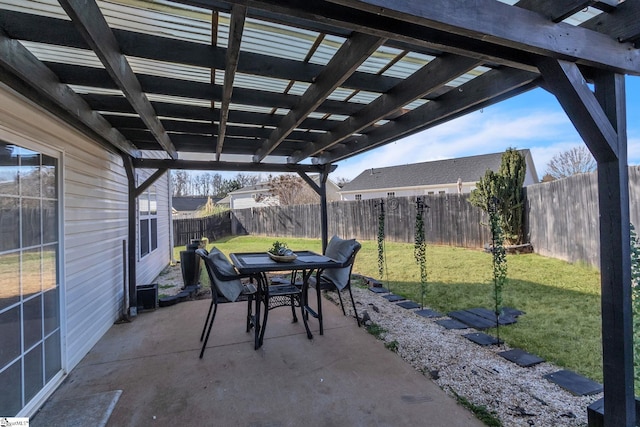 view of patio featuring a pergola, outdoor dining area, and a fenced backyard