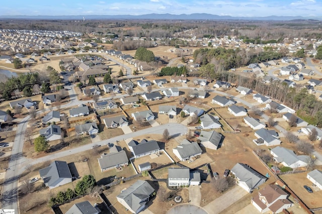 aerial view featuring a residential view and a mountain view